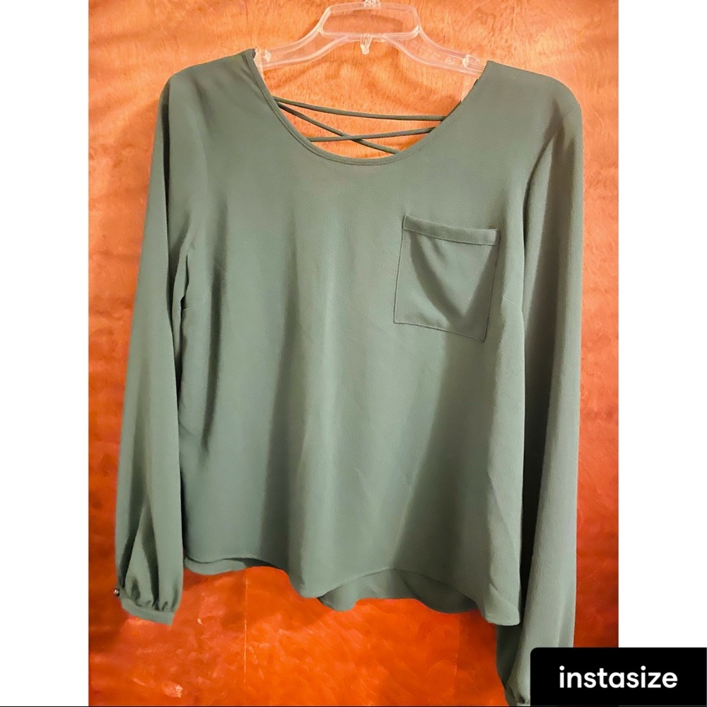 Green long sleeve top with back detailing